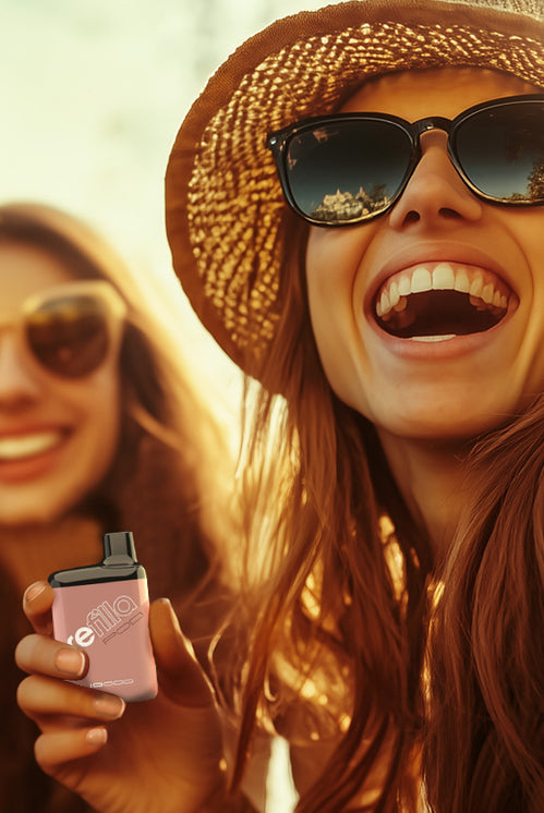 A group of young people enjoying a bright sunny day, one of them is holding a Refilla vape